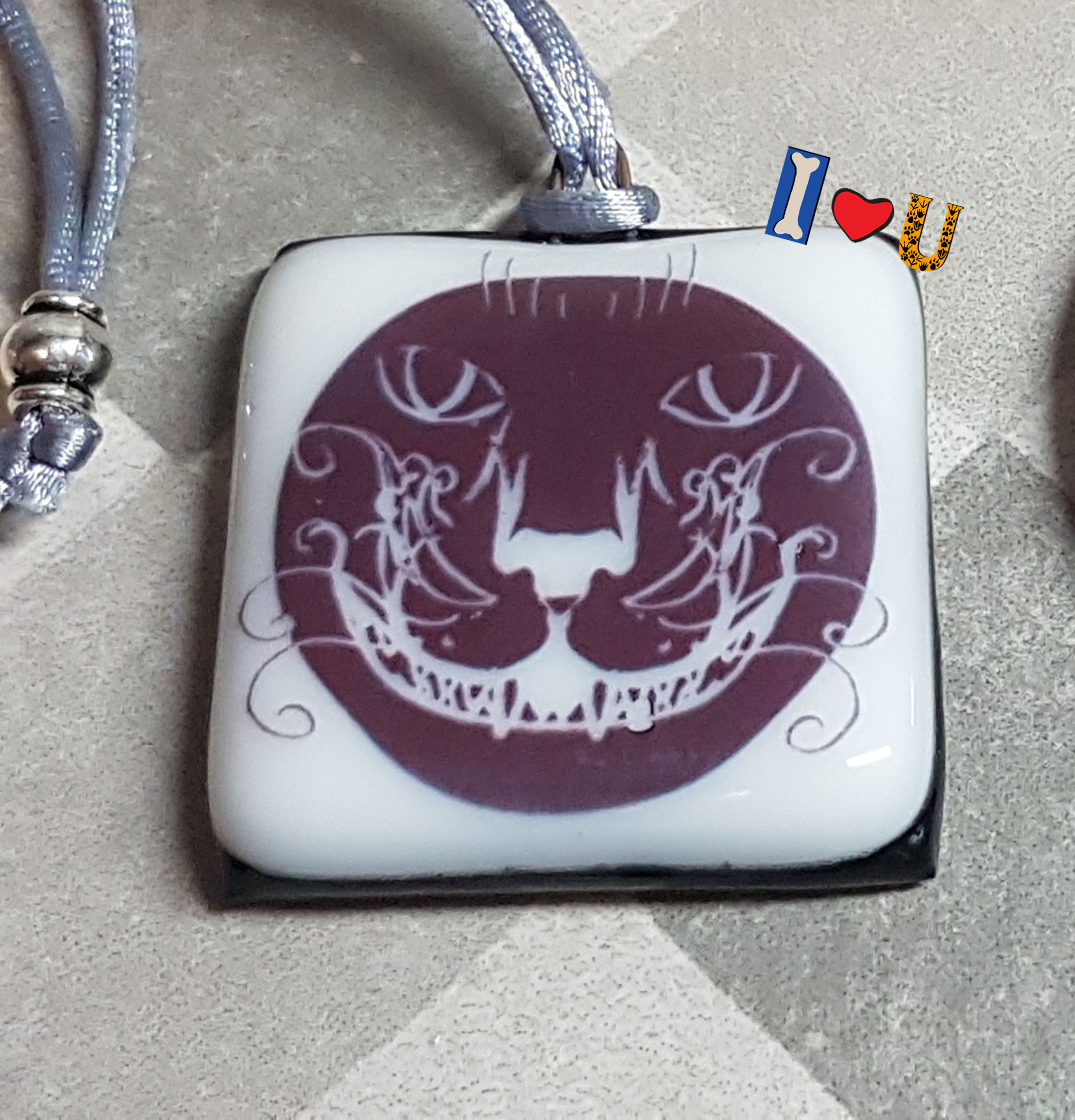 Colgante sonrisa Cheshire E143